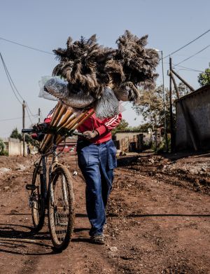 Feather duster & bicycle man by My Portfolio